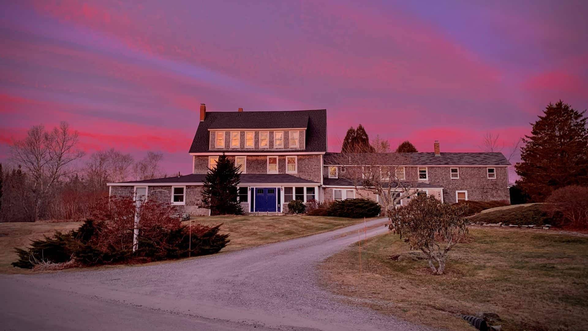 Green Grass And Fogg Under Purple Sky During Sunset Wallpapers