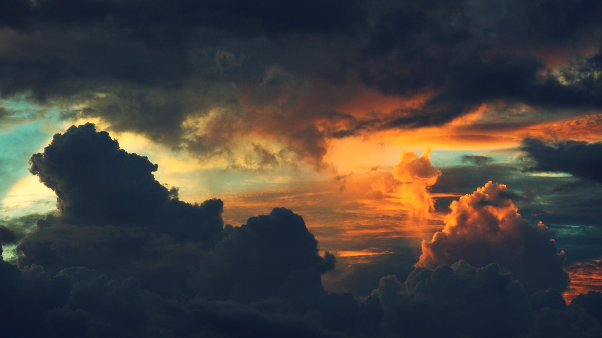 Red Sunset And Dark Clouds Wallpapers