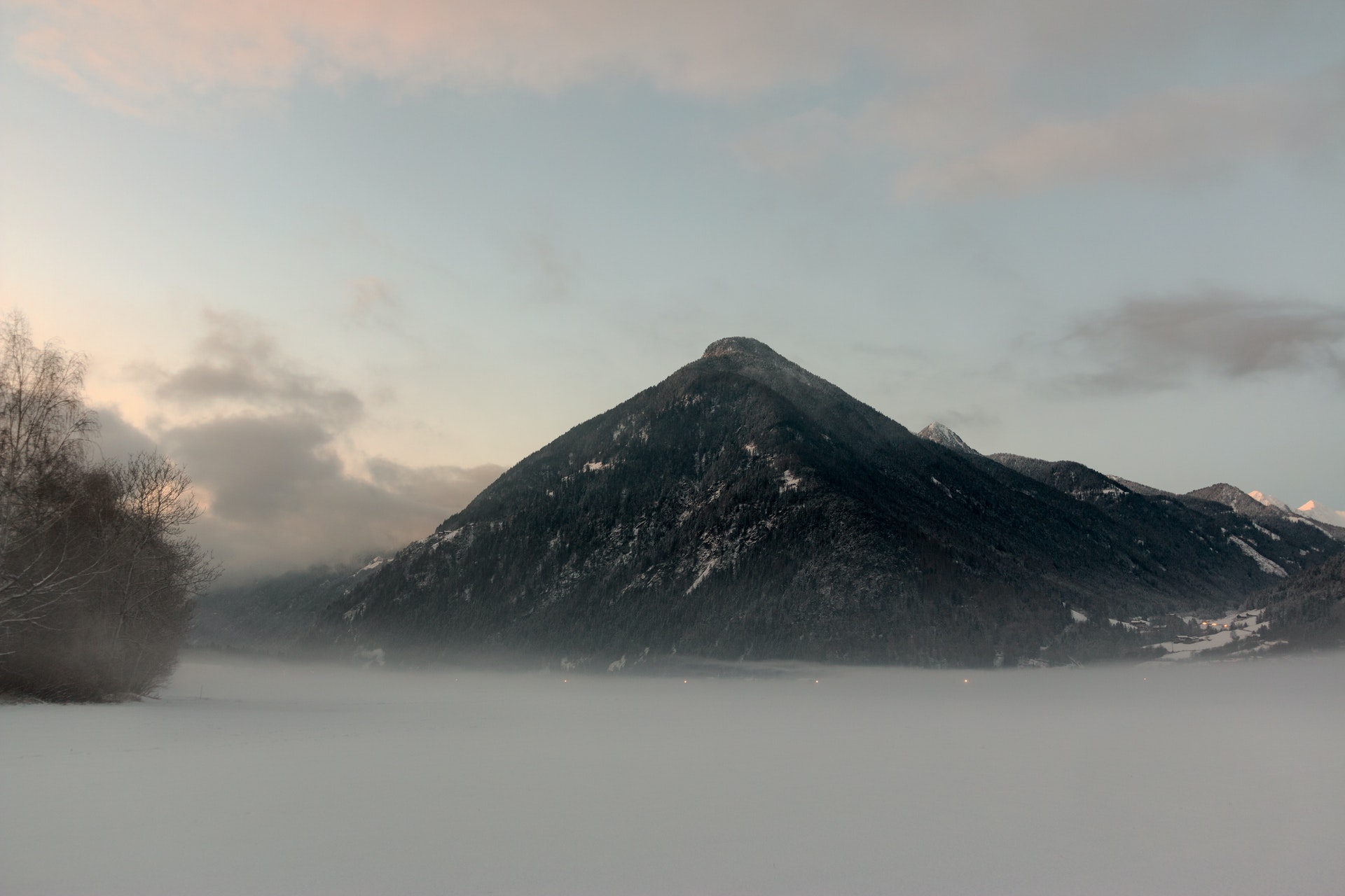 Snow Covered Mountains Under Black Cloudy Sky Wallpapers