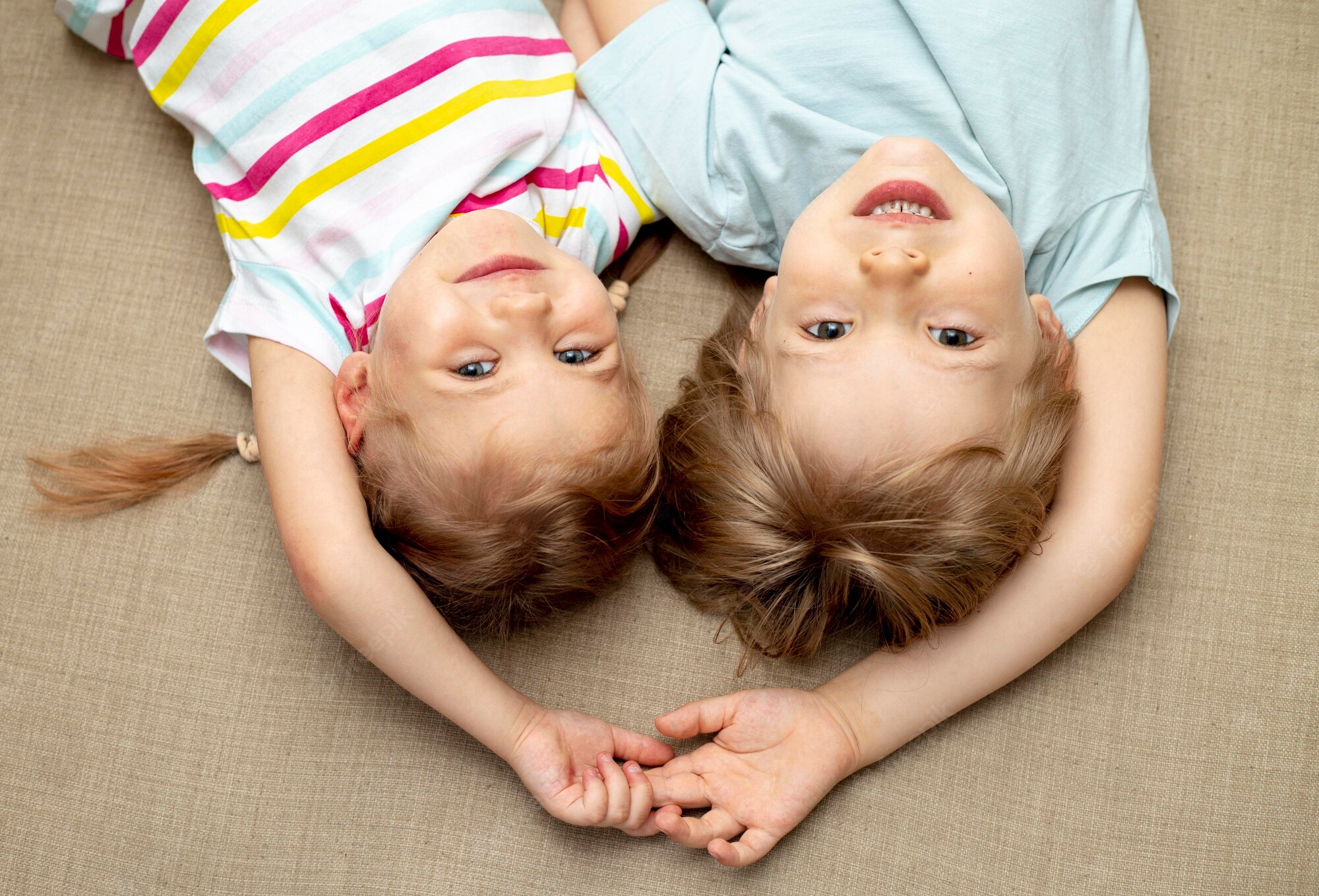 Cute Boy And Girl Are Sitting On Floor Wallpapers