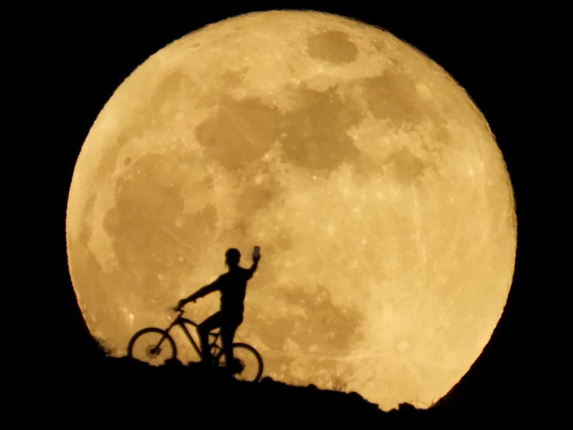 Cycling Near Yellow Moon Wallpapers