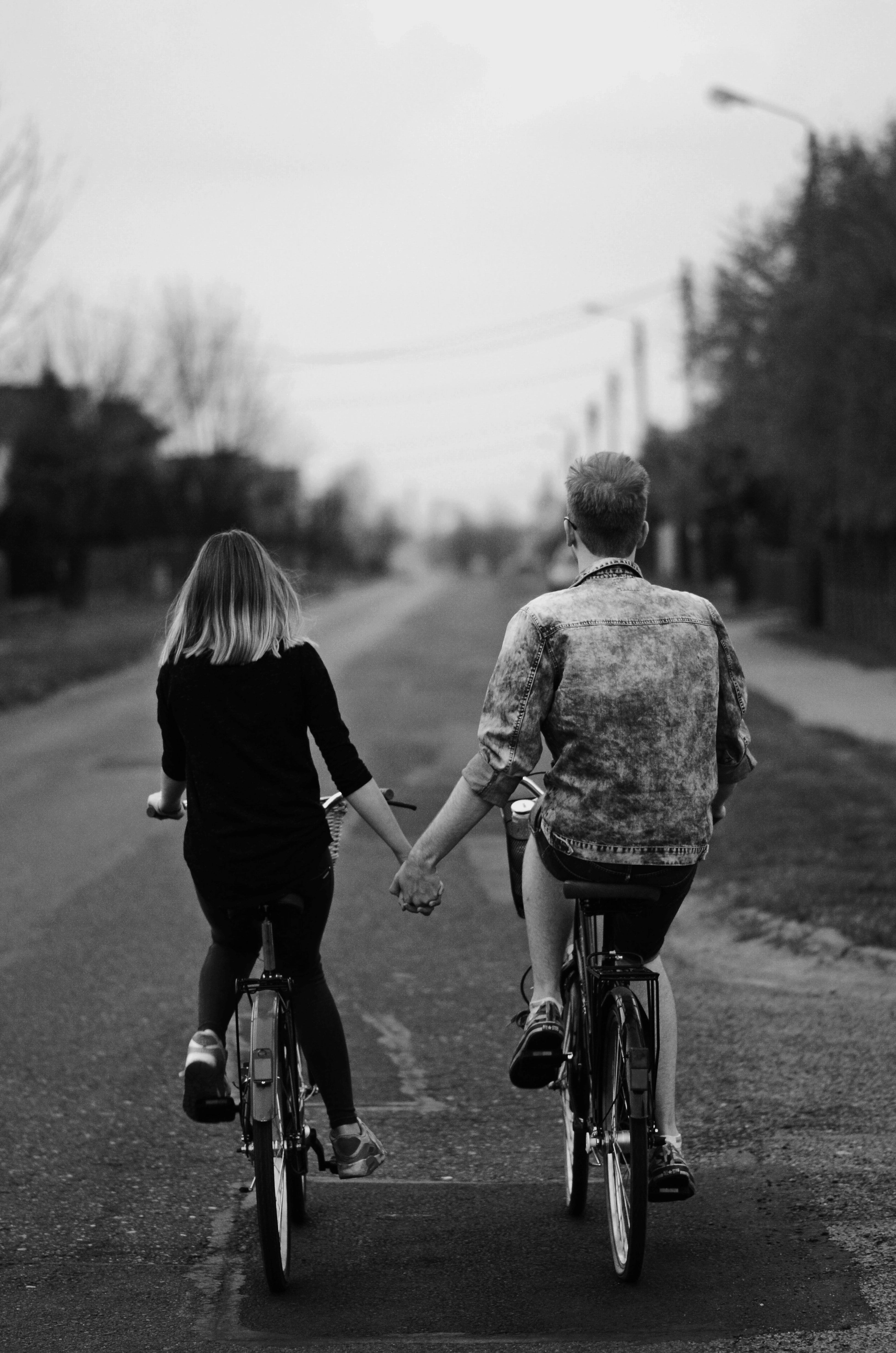 Girl Cycling Near Sea 4K Wallpapers