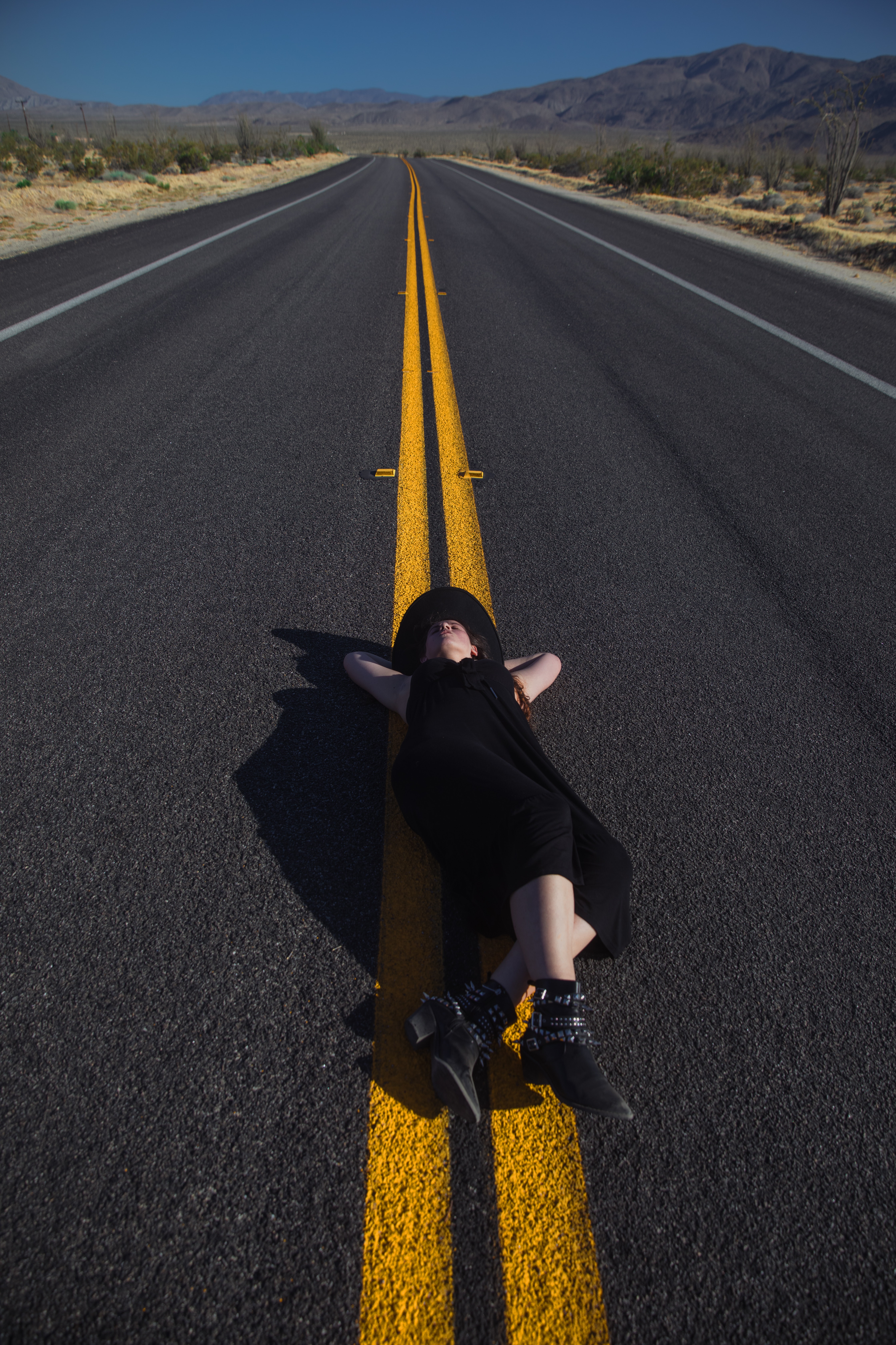 Woman Lying In The Road Wallpapers